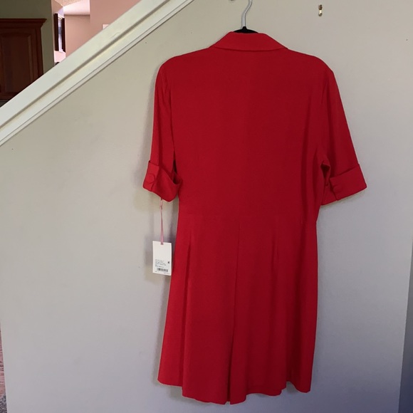 Alex Marie
Arielle Short Sleeve V-Neck Tie Front Romper Dress. - Picture 3 of 12